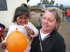 Annette with a child at Betania church in Chambitola