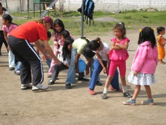 Becky leading her team in the games at 
