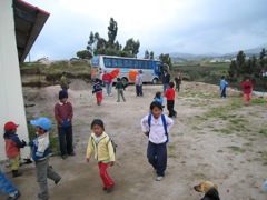 The kids come piling in at Betania church in Chambitola